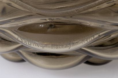 DAUM. France.
Large tinted glass bowl, decorated...