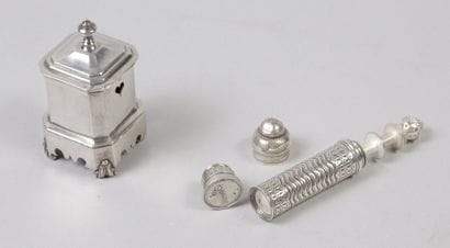 A small, cylindrical sewing kit. The top...