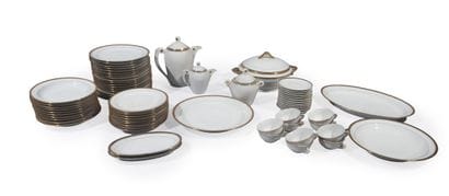 Limoges.
White porcelain dinnerware set decorated...