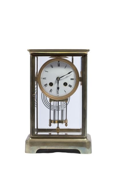Pendule cage en laiton et verre, ouvrant...