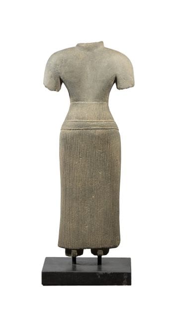 Feminine statuette wearing a sampot held...