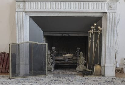 Fire set including tongs, a fire poker, a...