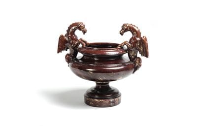 A bowl on a Medicis-style pedestal with handles...