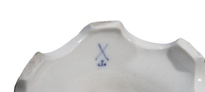 An openwork Meissen porcelain bowl on a foot,...