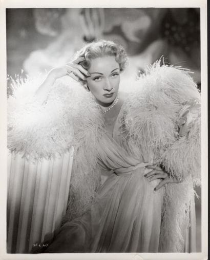 MARLENE DIETRICH
Dressed by Christian Dior...