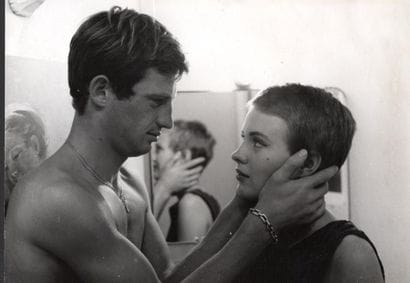 JEAN SEBERG AND JEAN-PAUL BELMONDO
Scene...