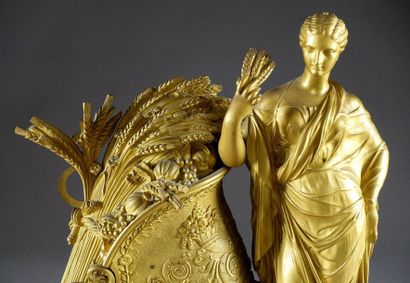 Rare et grande Pendule au Char de Cérès.
La...