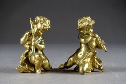 Couple de Putti.
L’un à l’arc, l’autre au...