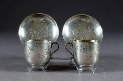 Paire de Tasses et leurs Soucoupes.
A décor...