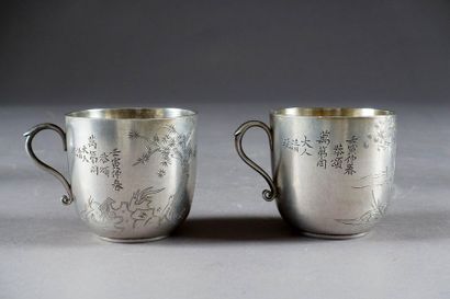 Paire de Tasses et leurs Soucoupes.
A décor...