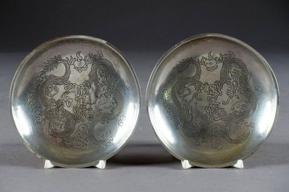 Paire de Tasses et leurs Soucoupes.
A décor...