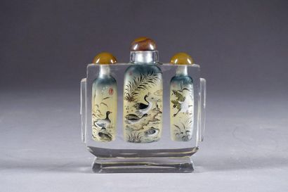 Tabatière triple.
The bottles are decorated...