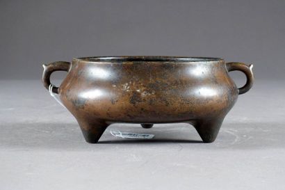 Brûle-Parfum.
It rests on three small cone-shaped...