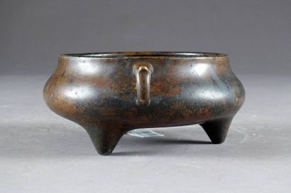 Brûle-Parfum.
It rests on three small cone-shaped...