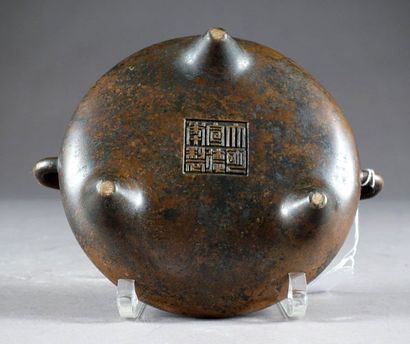 Brûle-Parfum.
It rests on three small cone-shaped...