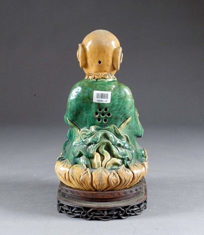 Milefo.
Shown sitting and smiling, a large...