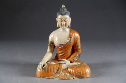 Bouddha méditant assis en Padmasana.
The...