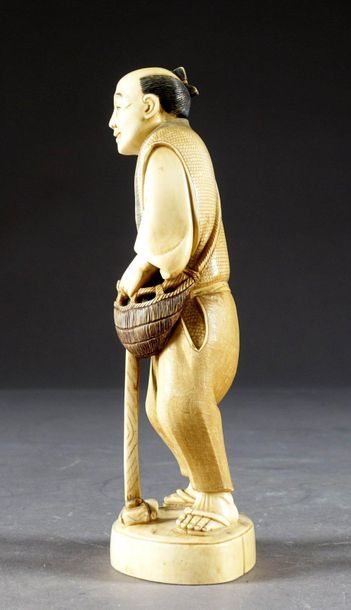 Okimono.
Figuring a peasant, with a hoe,...