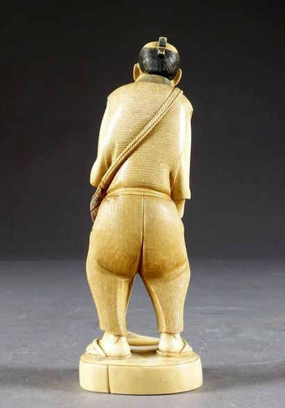 Okimono.
Figuring a peasant, with a hoe,...