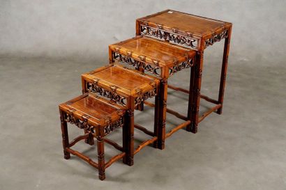 Suite de quatre Tables gigognes.
Openwork...