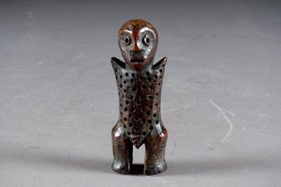 Figurine Lega.
Representing a standing figure...