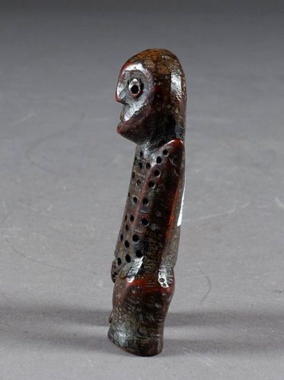 Figurine Lega.
Representing a standing figure...