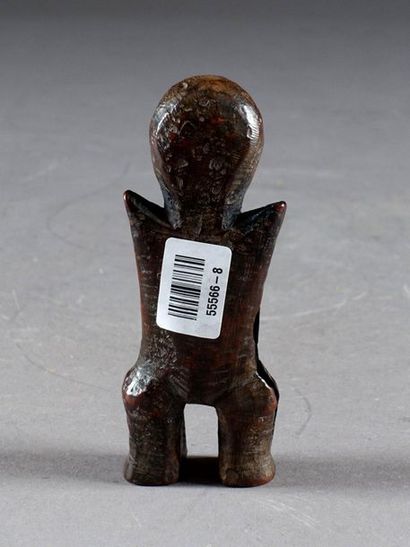 Figurine Lega.
Representing a standing figure...