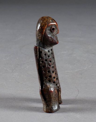 Figurine Lega.
Representing a standing figure...