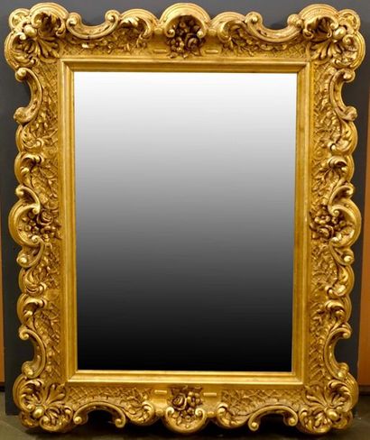 Miroir de Style Régence.
Large frame strongly...