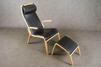 Fauteuil et Repose-Pieds Design.
Structure...