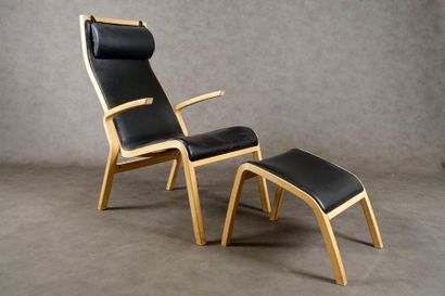 Fauteuil et Repose-Pieds Design.
Structure...
