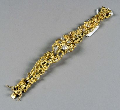 Important Bracelet.
Motifs ajourés, d'inspiration...