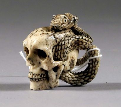 Memento Mori. Figurant un crâne enlacé par...