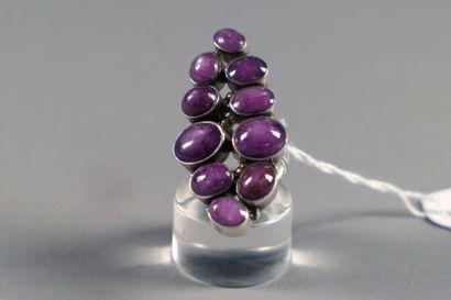 Importante Bague de Dame. Sertie de dix rubis...
