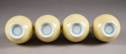 Suite de quatre petits Vases balustre. A...