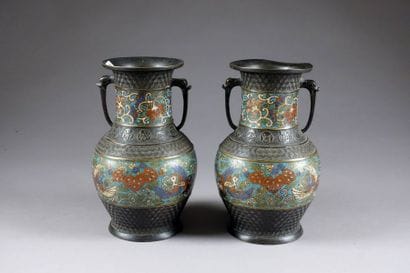 Paire de Vases balustre. A frises émaillées,...