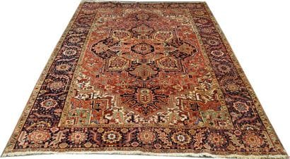 Tapis Hériz. Large médaillon à double palmette...