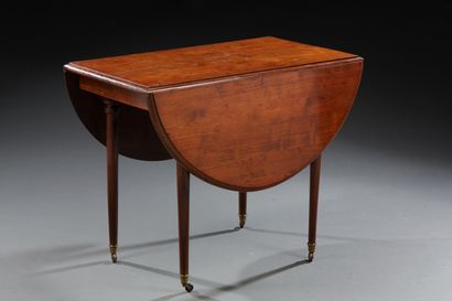 Table à volet dépliante en acajou et placage...