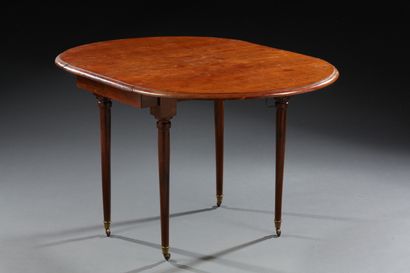 Table à volet dépliante en acajou et placage...