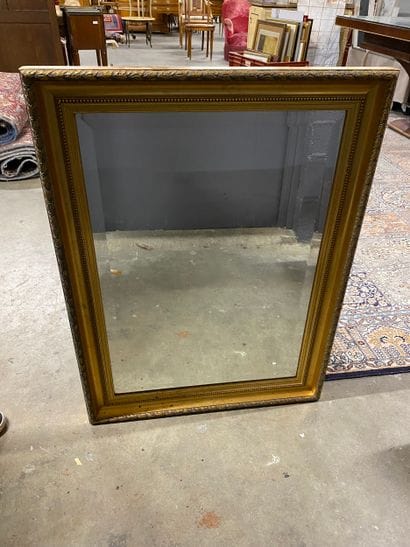 Miroir rectangulaire biseauté dans un encadrement...