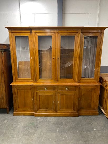 Bibliotheque en bois naturel ouvrant par...