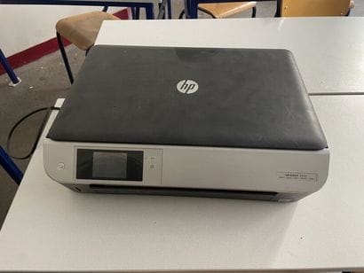 Imprimante HP ENVY 5534, n° de série CN4AD410QR.
En...