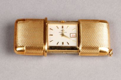 MONTRE pendentif en or jaune. MOVADO.
Pds...