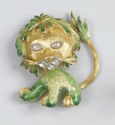 BROCHE lion en or émaillé vert, les yeux...