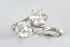 BAGUE TOI ET MOI ornée de deux brillants...