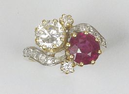 BAGUE toi et moi ornée d'un brillant et d'un...