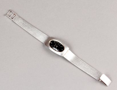 MONTRE BRACELET de femme en or blanc. Alex...