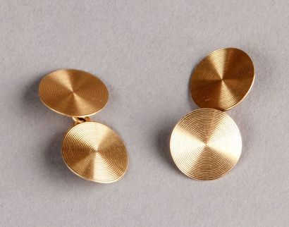 PAIRE DE BOUTONS DE MANCHETTE en or jaune...