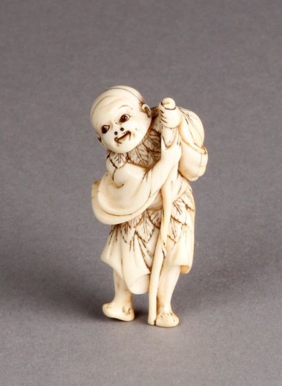 Petit NETSUKE en ivoire représentant un aveugle...