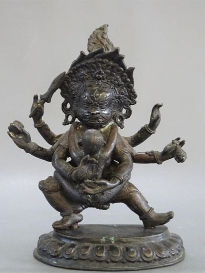 Divinité asiatique en bronze patiné
23 x...